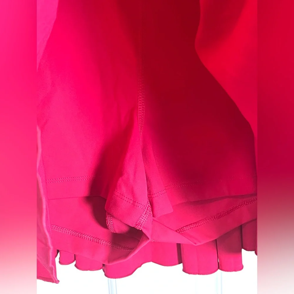 Aritizia TnAction TnaMove Tennis ProMicro pleated high rise Skirt Fuscia Size XL